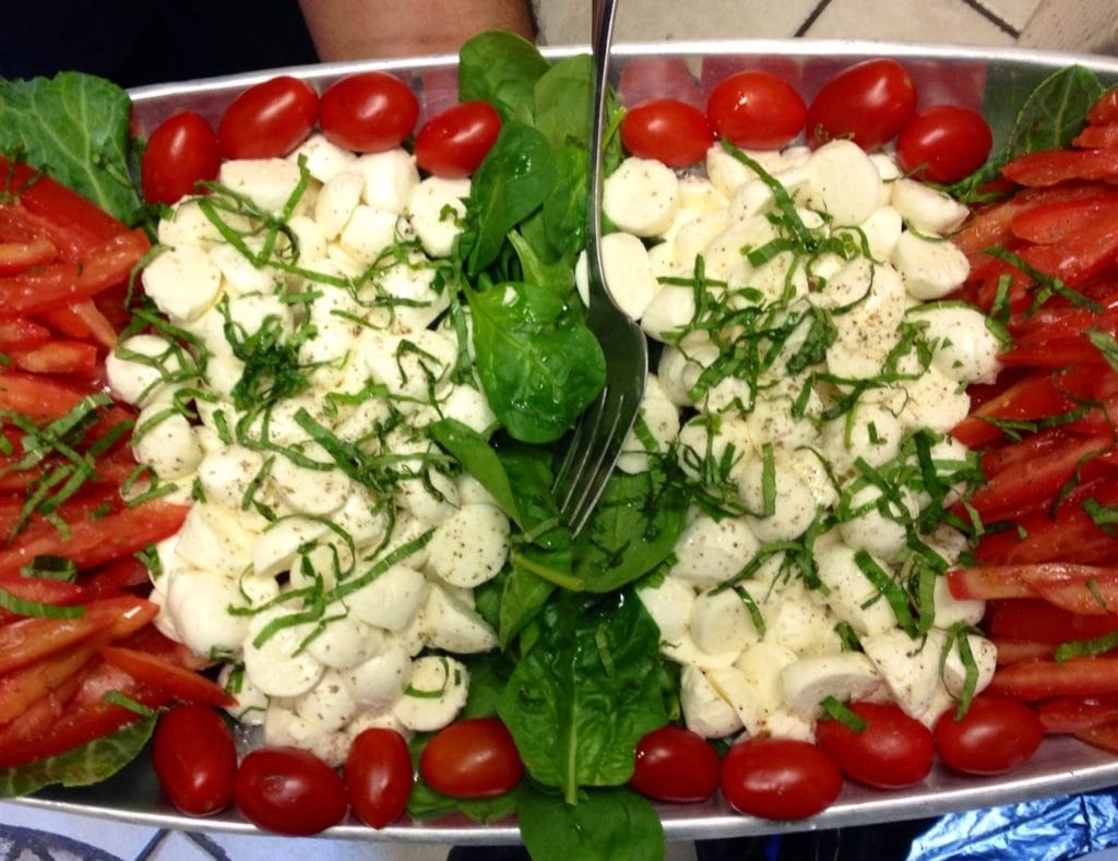 catering with tomato basil salad